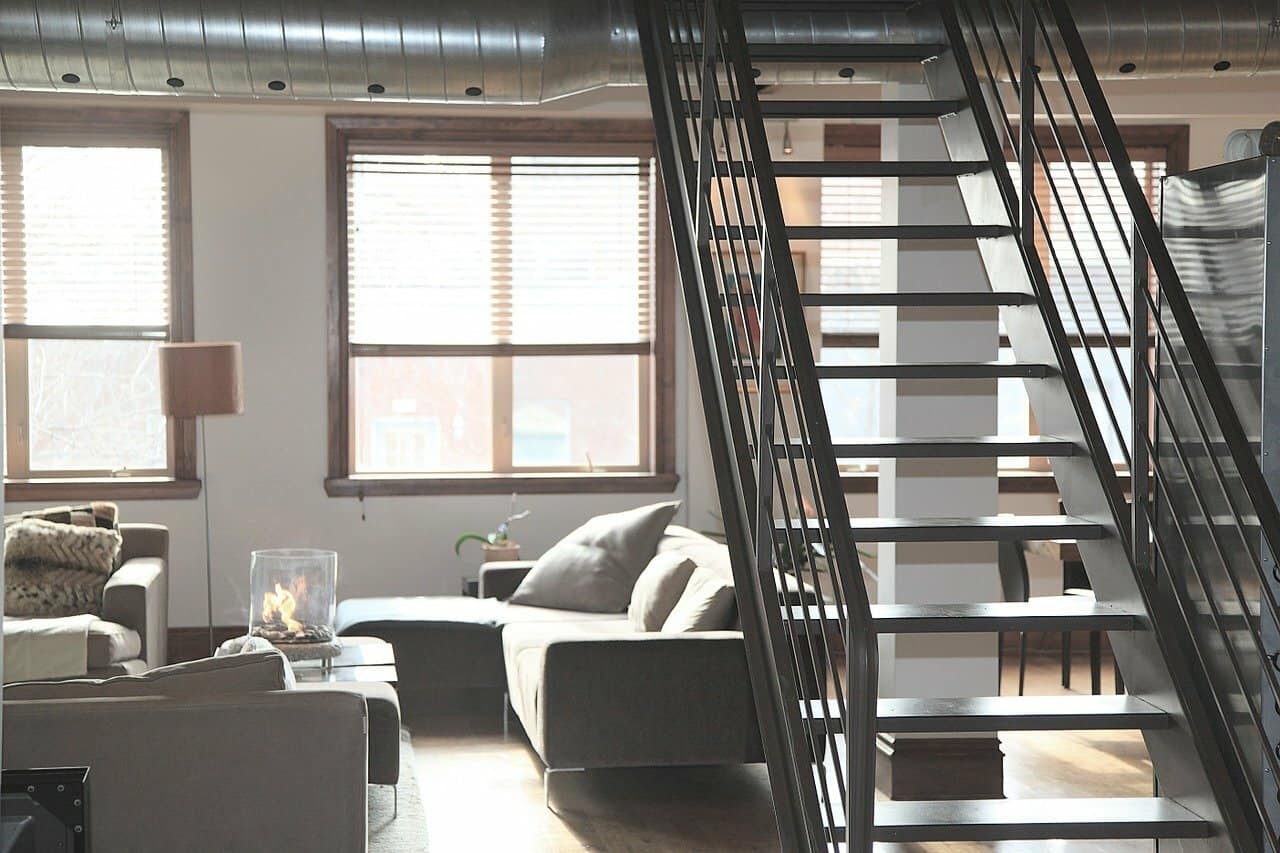 Industrial-style living area of an apartment unit.