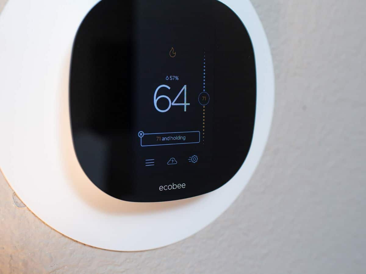 ecobee smart home thermostat showing 64 degrees