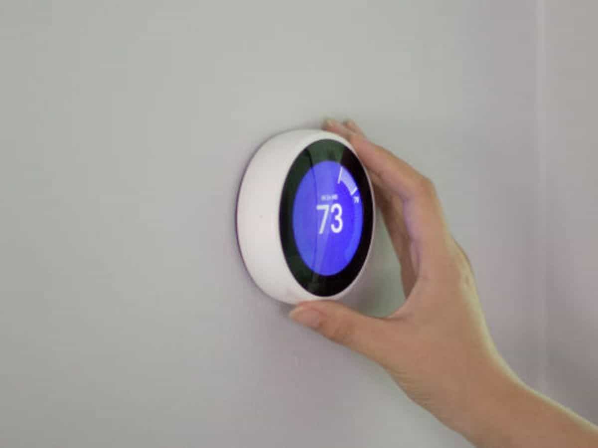 nest smart thermostat showing 73 degrees