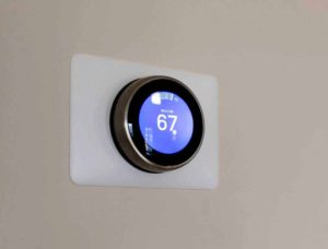 nest smart thermostat showing 62 degrees