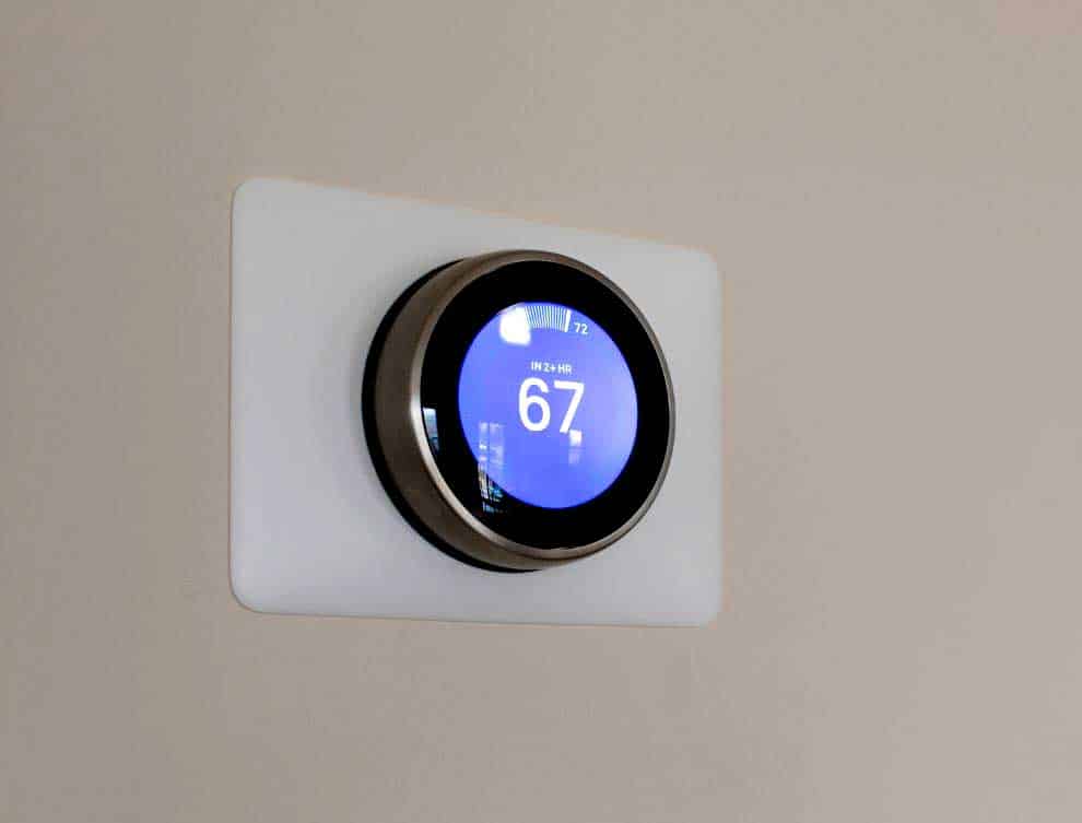 nest smart home thermostat showing 62 degrees