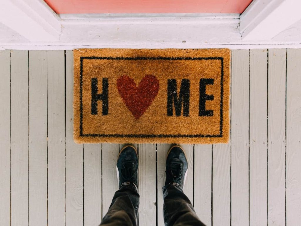 front porch doormat with pink front door