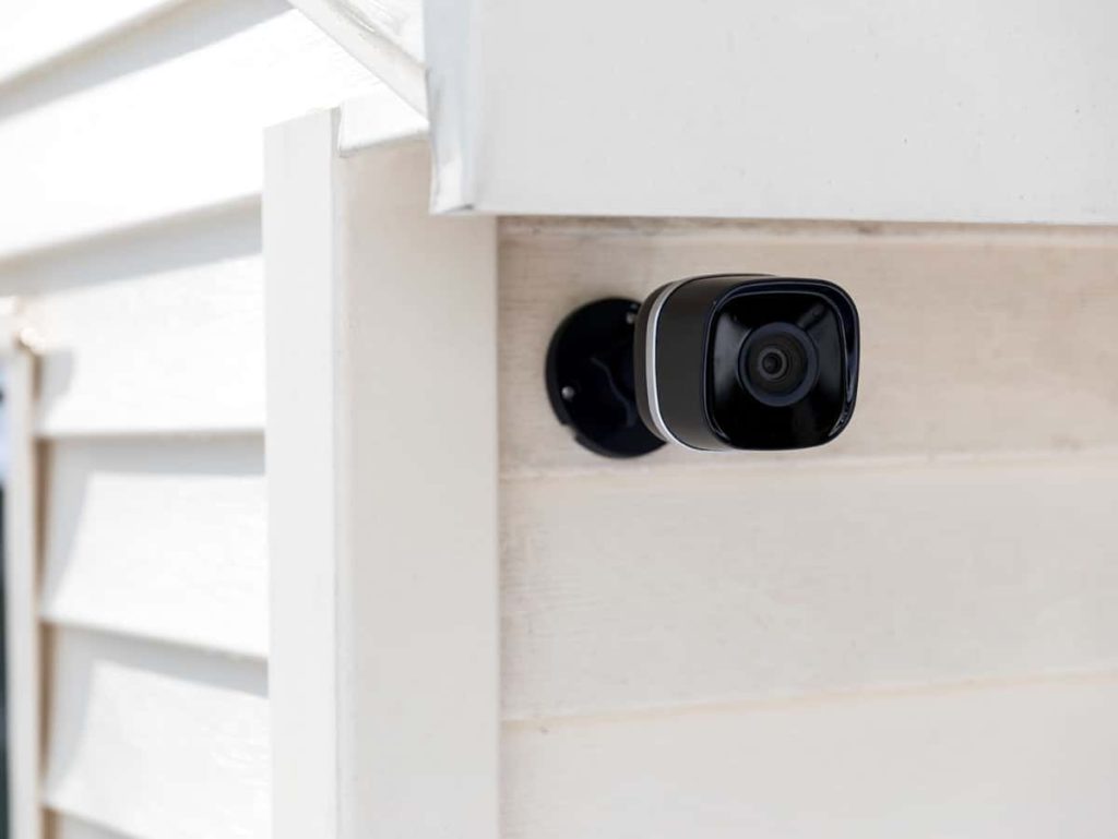 outdoor security camera system positioned on the house