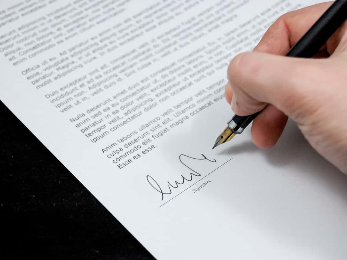 handwriting contract with pen