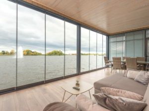 Impact windows installed of a home overlooking the water.