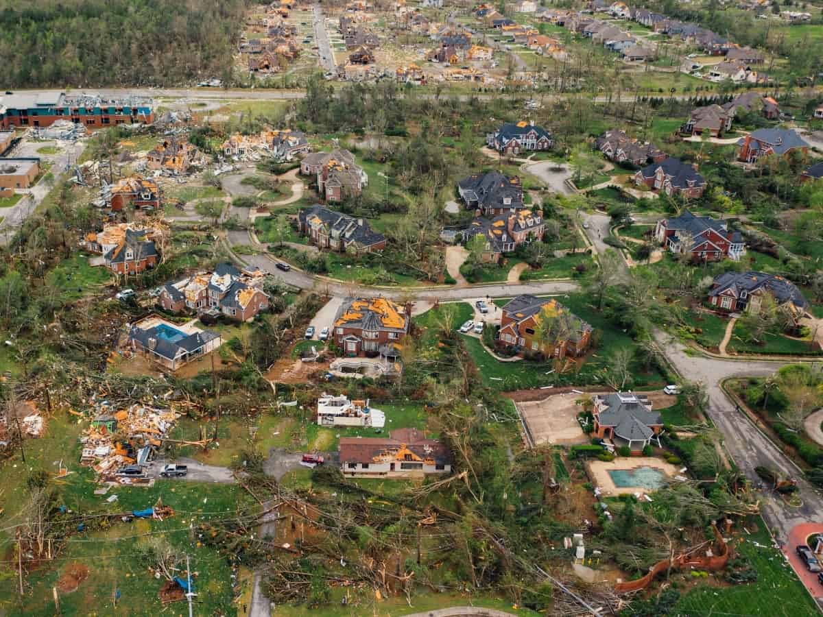 aftermath of a tornado pathway, destroyed homes
