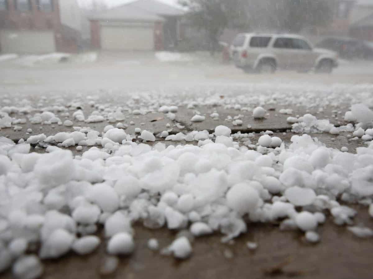 a hail storm resulting in hail on a driveway
