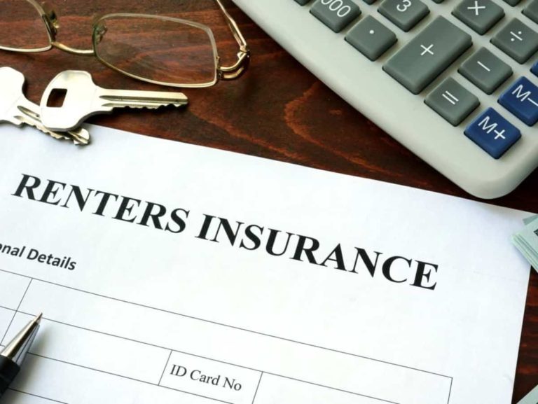 a renters insurance form with house keys, and a calculator