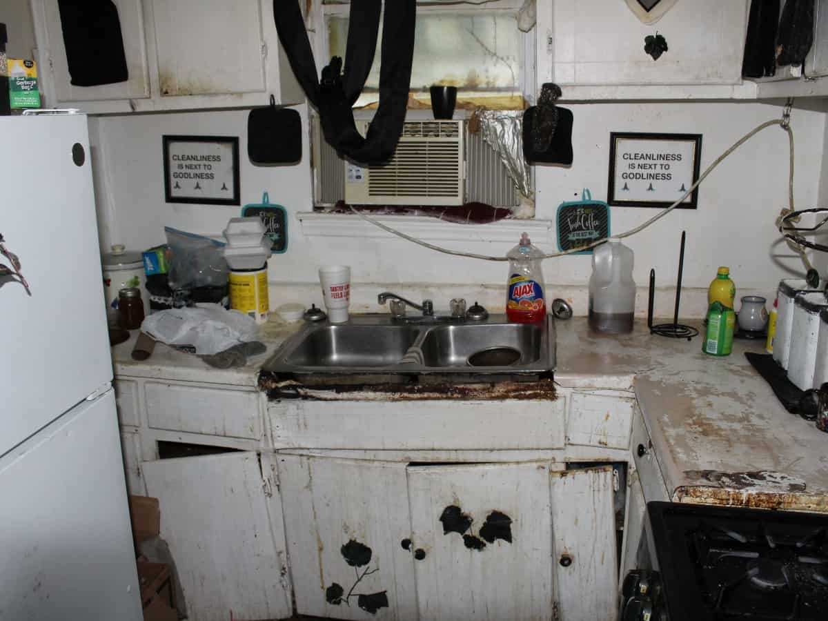 the interior of mr. medlock's kitchen as a before picture from rebuilding together north texas