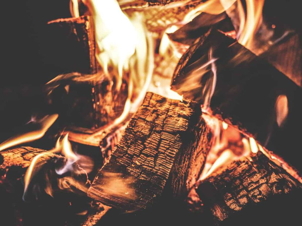 a closeup of a fire in a fireplace