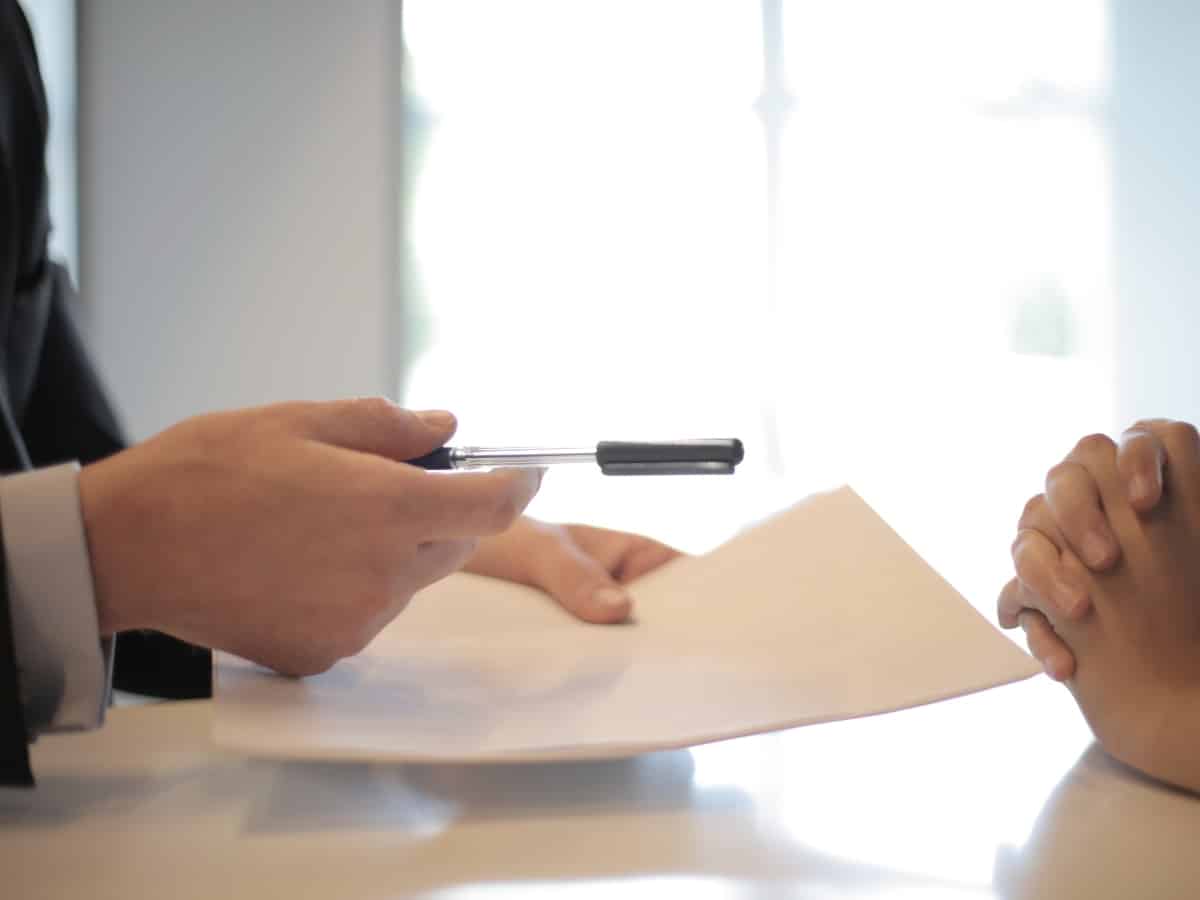 two people negotiating to come to terms on insurance or agreement