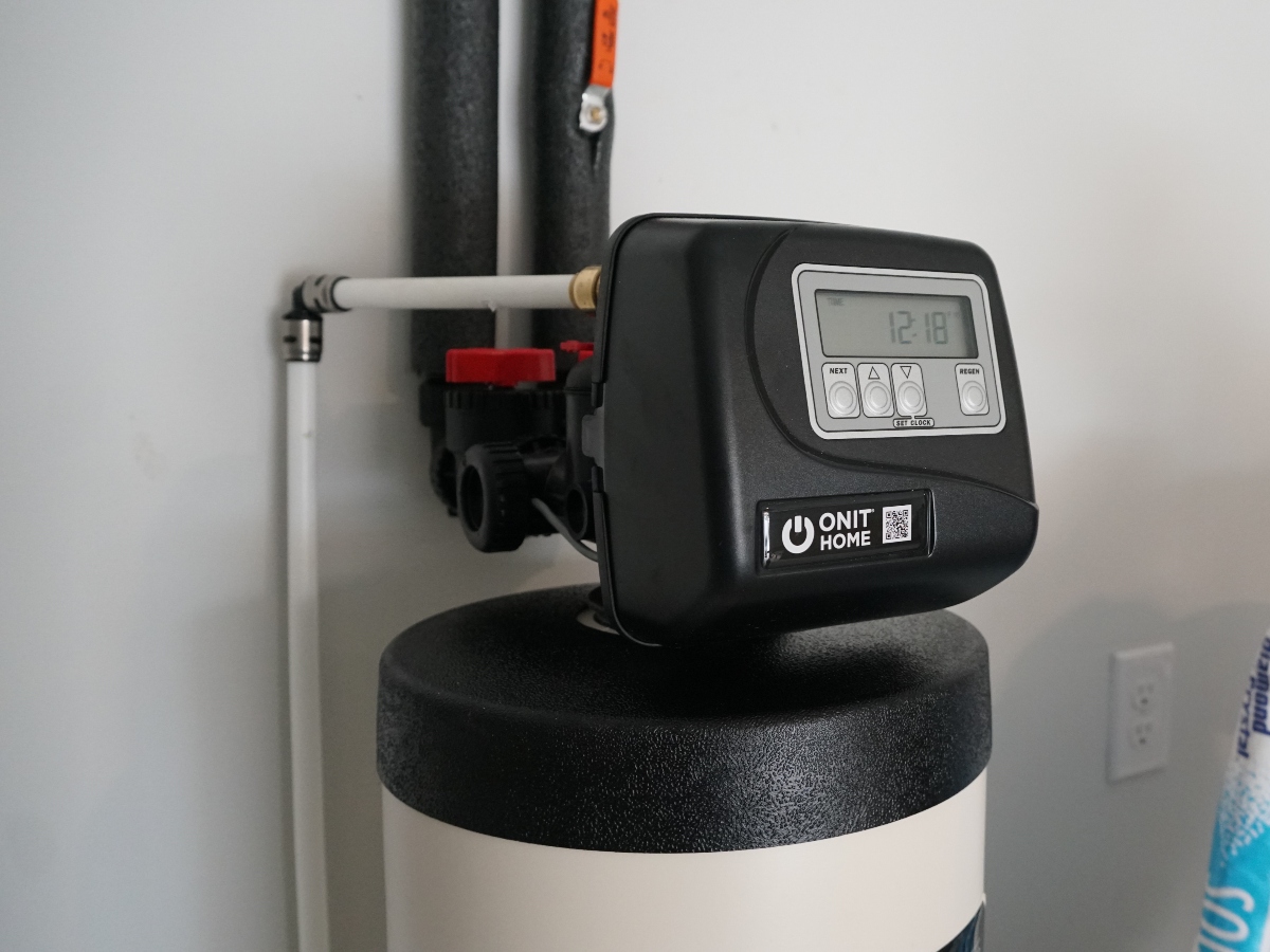 an onit home water filtration system installed in a garage in texas