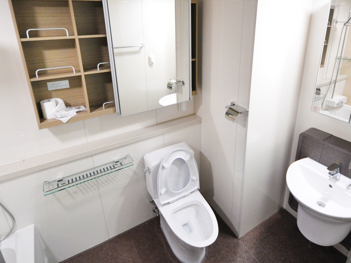 a birds eye view of a bathroom with a sink and toilet