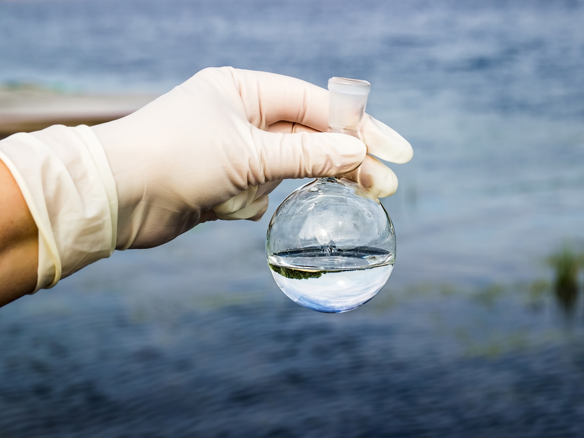 Samples of water from the river. Water intake. Water abstraction. Water diversion. Environmental pollution.
