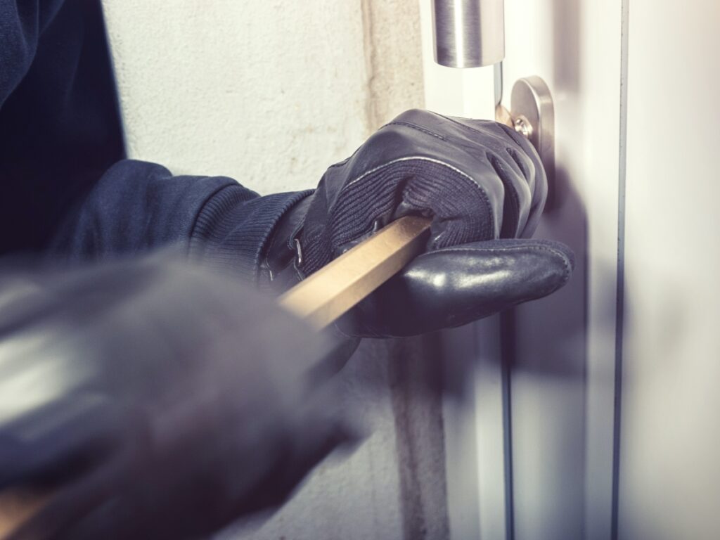 a burglar using extreme force to break in to a home