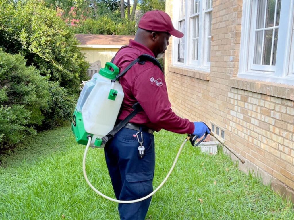 a pest control worker making sure that pests stay away from home