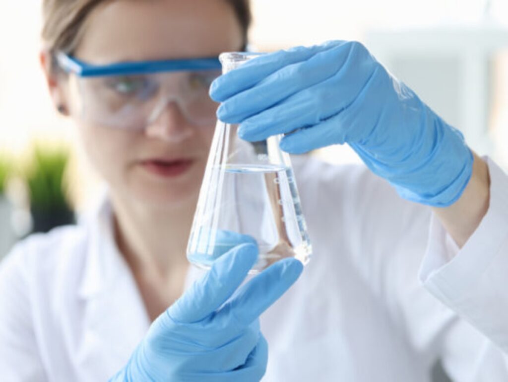 an image of a scientist performing a water test to test for different contaminants