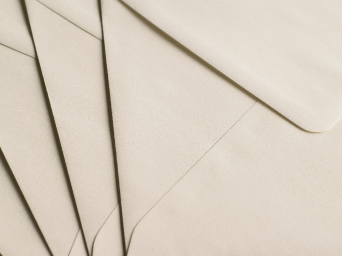 a closeup of white or cream envelopes for mail 