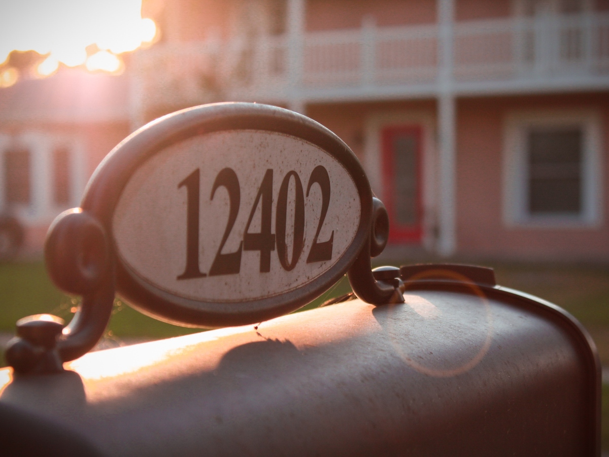 an upclose image of a mailbox with address numbers