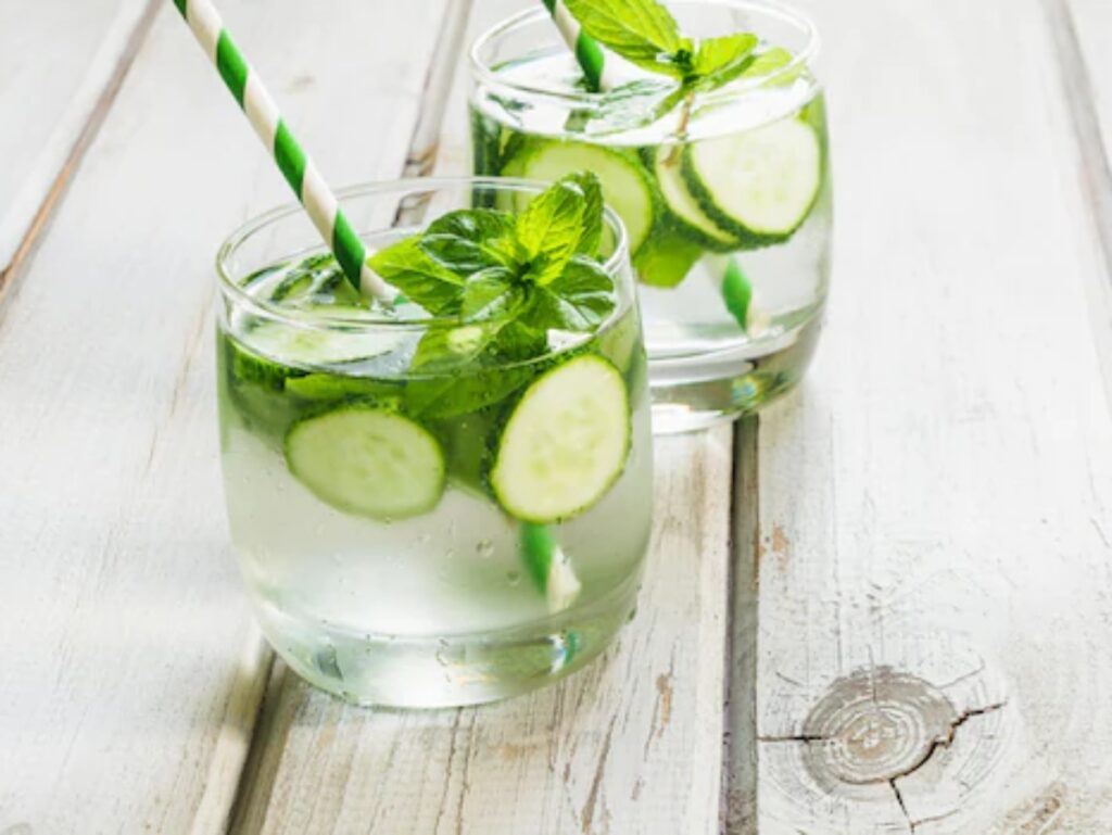 mint and cucumber water in a large glass