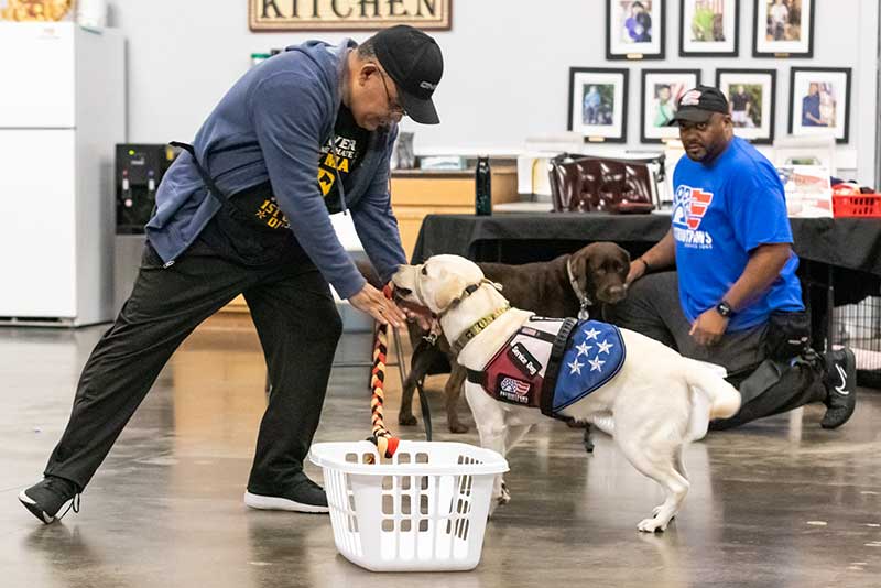 members of Patriot Paws working with dogs