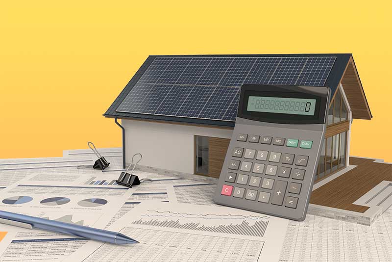 house with calculator and financial forms