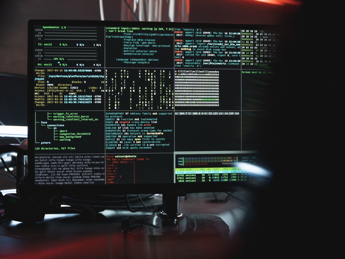 a large computer screen with HTML code for cyber security hacks