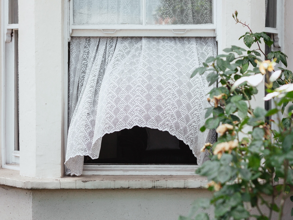 open window in a home to let in cool air