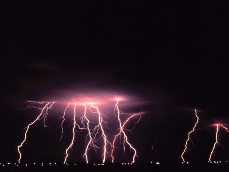 large bolts of lightning coming down during a storm