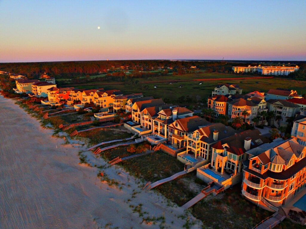 a row of vacation homes on the beach