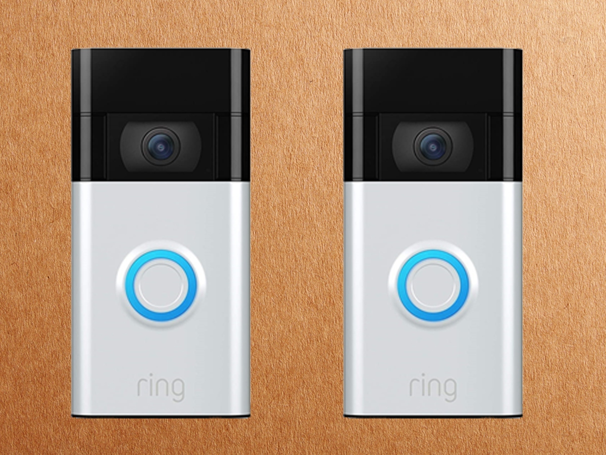 two ring doorbell against a brown background. this video doorbell is used to monitor your home