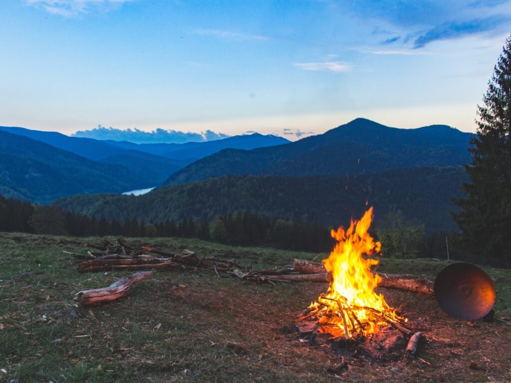 an open flame on a campground