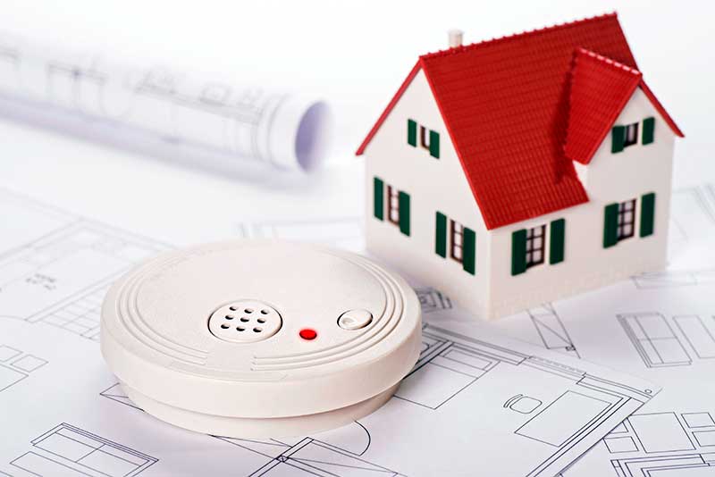 smoke detector with house