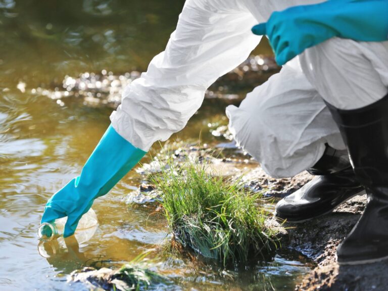 a scientist taking a collection of water to test for PFAS, forever chemicals and PFBS