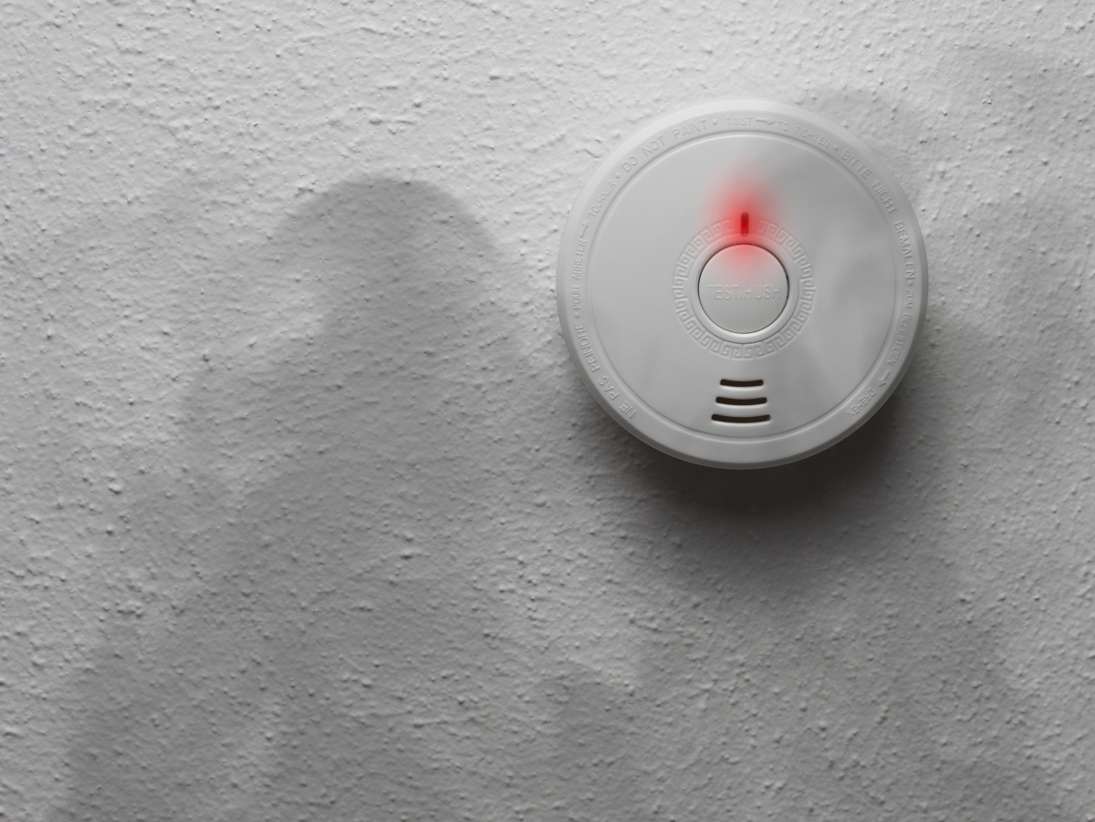 a carbon monoxide alarm on a wall to protect against carbon monoxide poisoning