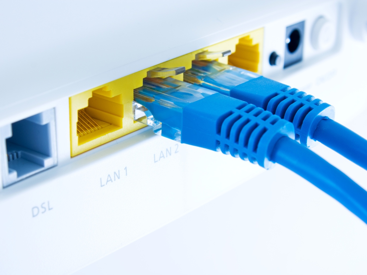 two blue cords in an internet modem