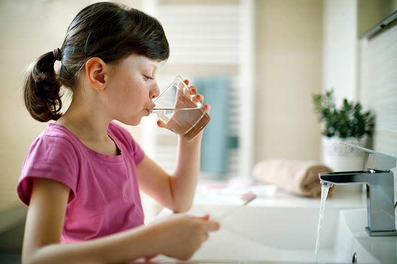 girl drinking water